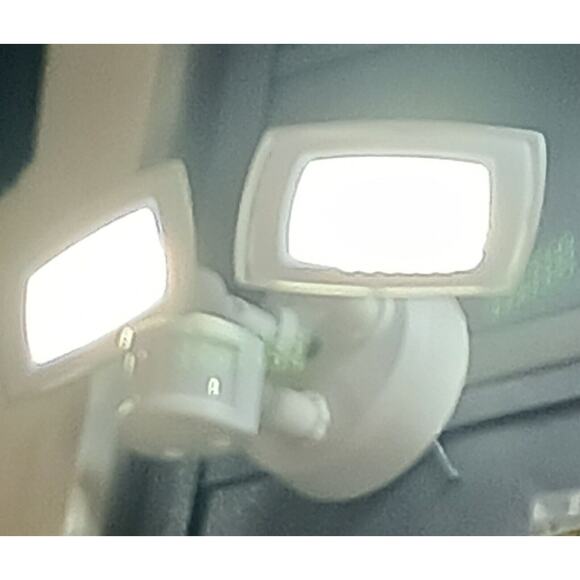 Motion Detection 60 Ft away Flood Light LED WHITE Twin Head Adjusts NEW in Box! - Picture 10 of 16